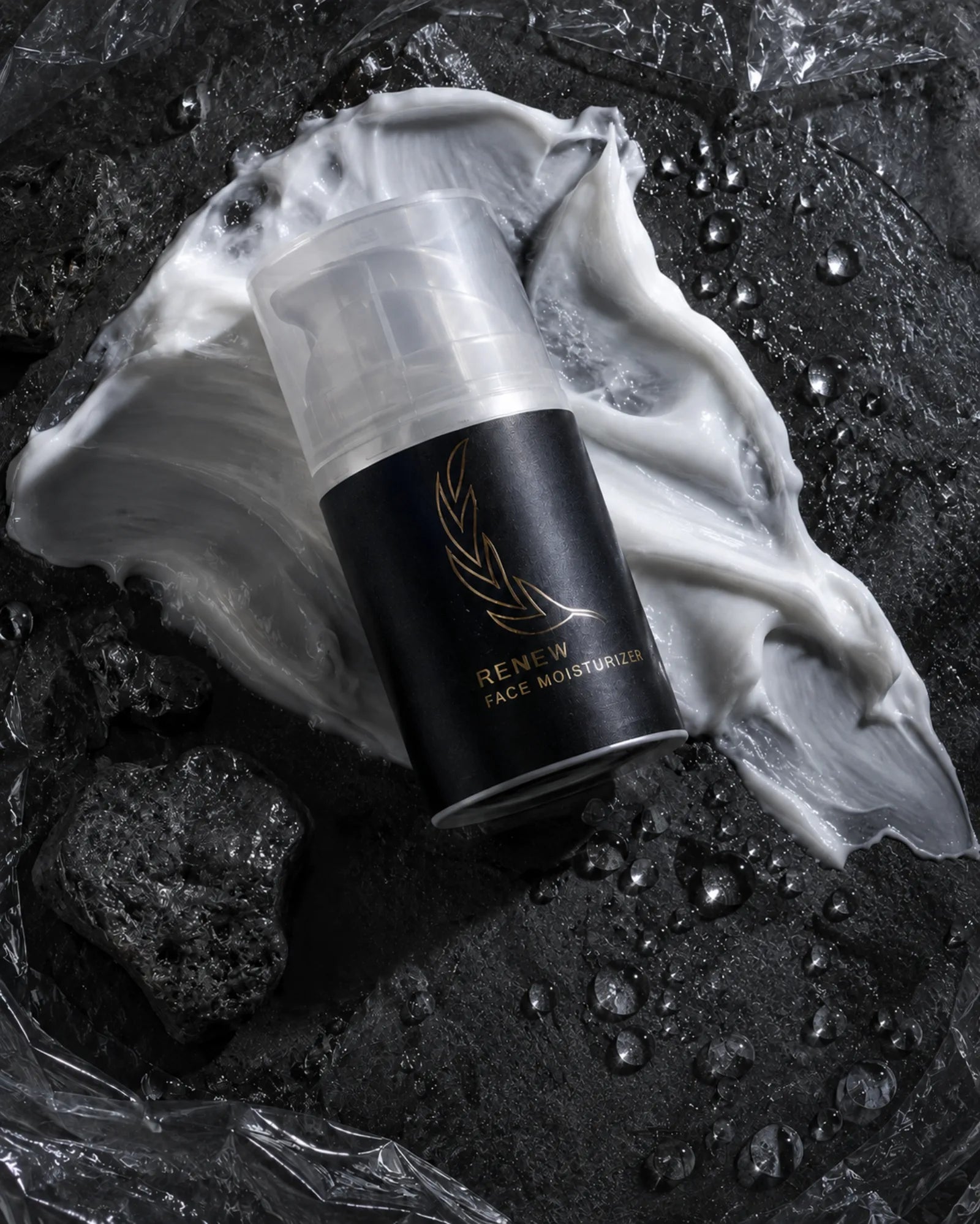 Renew face moisturizer surrounded by rich cream and water